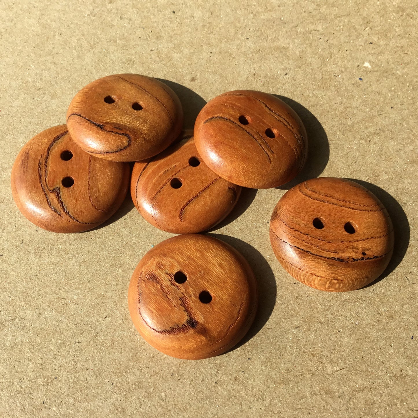 Mineral Streaked Polished Cherry Wood Buttons  1"